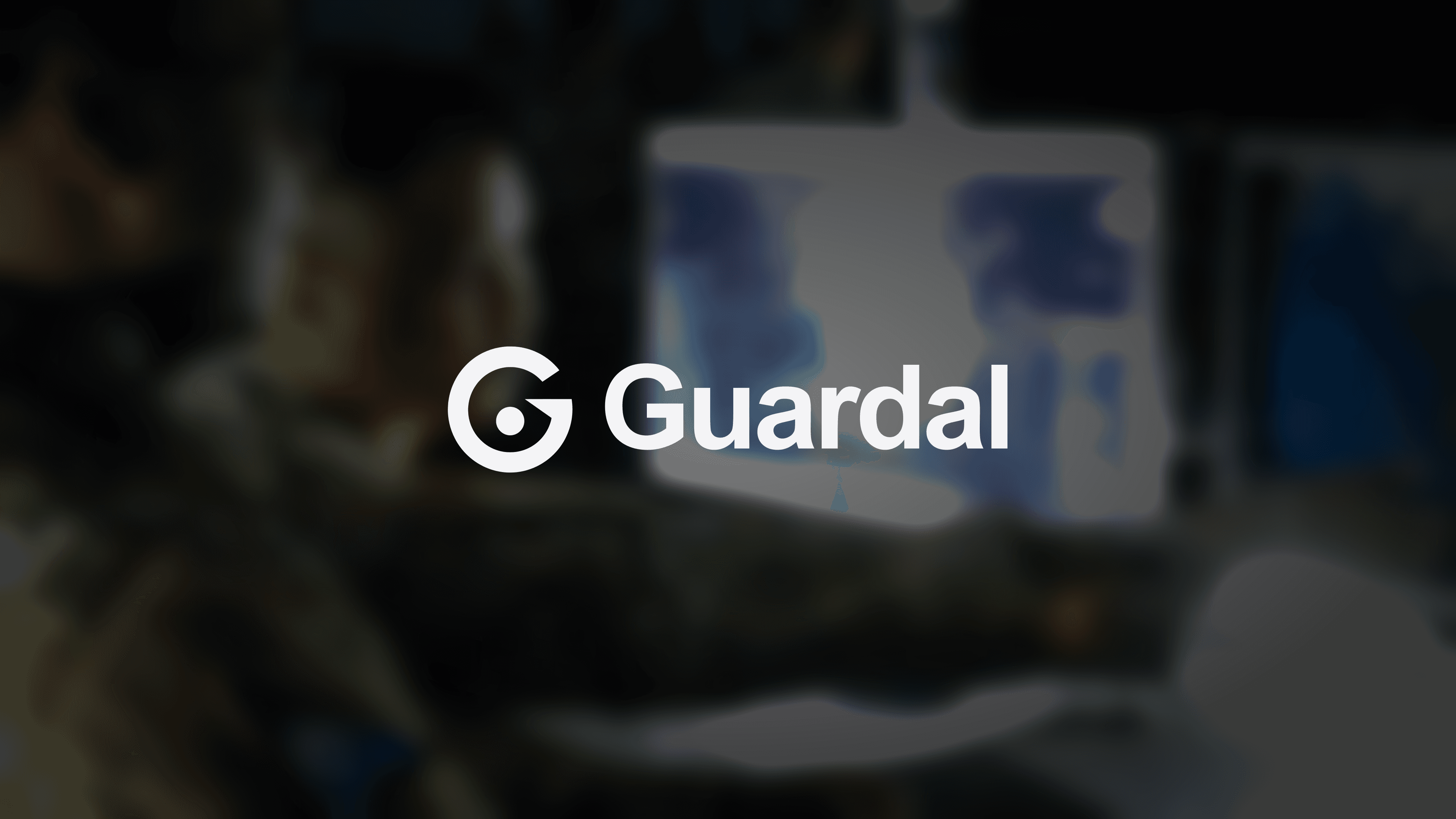 The Guardal logo over a blurred and darkened operations-center photo